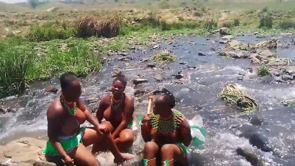 Busty topless African girls singing in river - xh.video