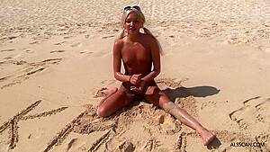 Dirty naked blonde girl is cuddling her bad bestie’s gentle pussy, while on the beach - hdzog.com