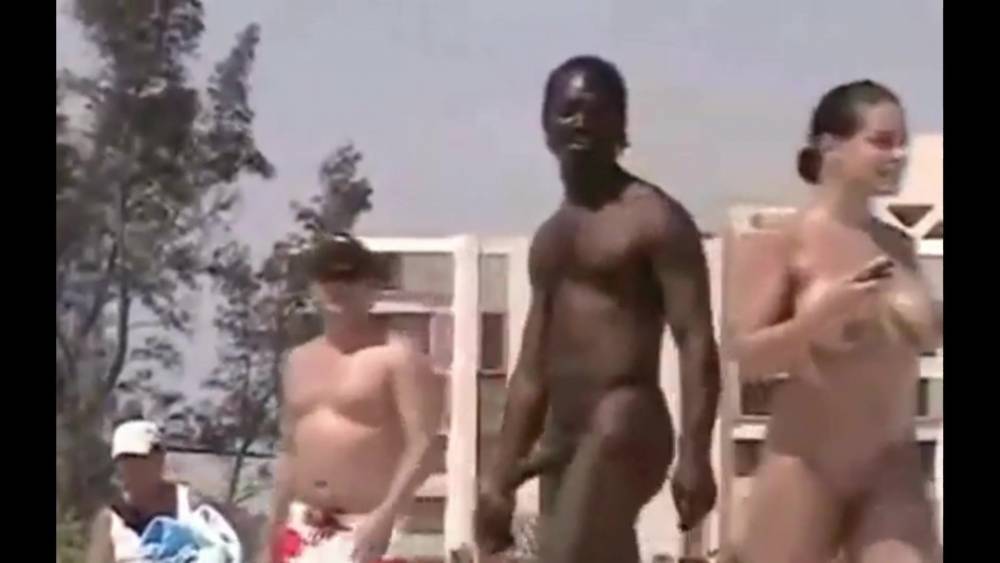 Nudist woman picking up Black man on beach - xhamster.com