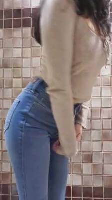 Showing Off Her Ass In Tight Denim Jeans - hclips.com