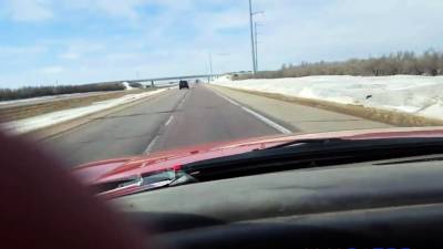 Girl squirting while driving down the interstate - drtuber.com