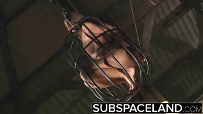 Slave trapped in a cage submitted to bondage sex BDSM - bdsm.one