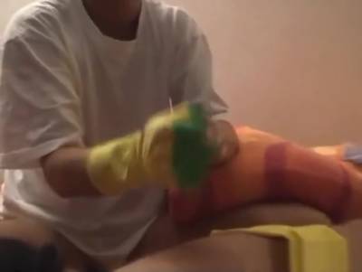 Housewife In Yellow Rubber Gloves Gives Handjob With Oil - hotmovs.com