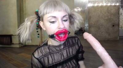 Russian girl fucks herself in the throat with a rubber dick - sunporno.com - Russia