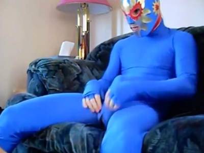dude in mask a blue zentia suit strokes his big cock - nvdvid.com