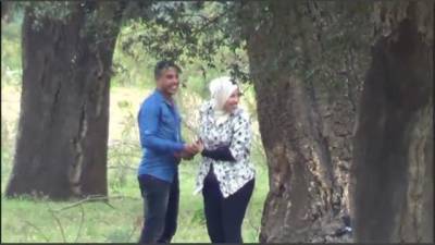 Arab couples in public park - sunporno.com