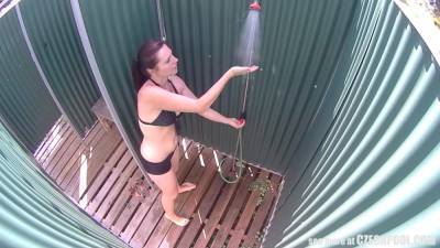 Brunette Milf Showering In Public Pool - voyeurhit.com