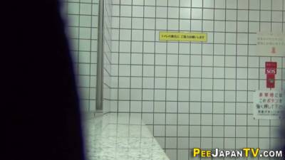 Asian babe pees in public toilet - pornoxo.com