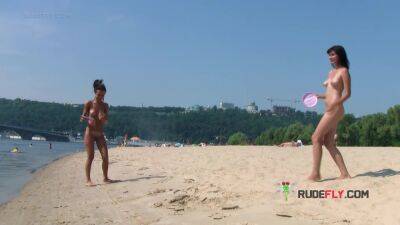Bombastic young nudist babes sunbathe nude at the beach - hclips.com