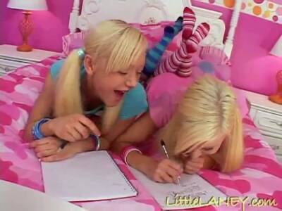 Blonde petite lesbians get wet together - txxx.com