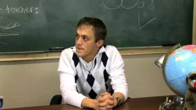 Serbian young gay sex Teacher is sitting at his desk looking - nvdvid.com - Serbia