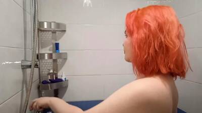 Tattooed redhead touches herself in the bathroom - drtuber.com