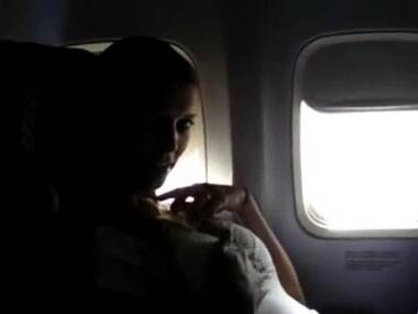 Hot blonde masturbates on a commercial flight - nvdvid.com