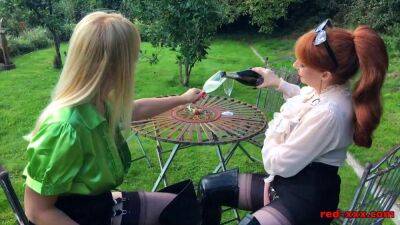Redhead British mature Red and her hot busty blonde girlfriend are outside enjoying a bottle of wine. Next thing you know, Red has her face deep in her girlfriends cunt! - sunporno.com - Britain