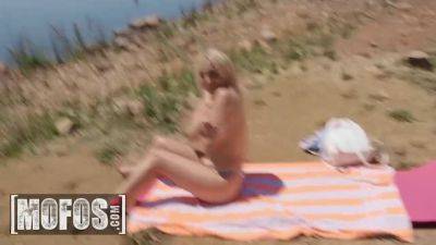 Jordi E.N. Polla & Lisi K.T. Sunbathing in the lake topless with a big cock for a hot - sexu.com