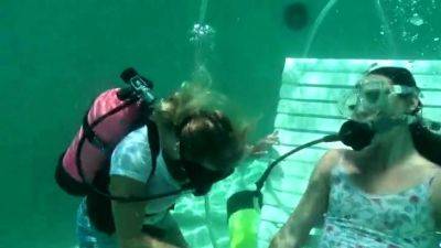 Scuba woman tied in chair underwater - drtuber.com