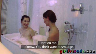 Kira Zen's big tits friend gets a wet pussy fingering in the bath with her girlfriend's help - sexu.com