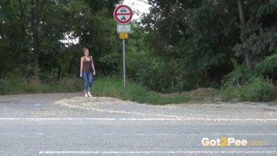 Watch this European babe get wet & wild while peeing in public - sexu.com