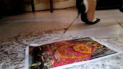 Girl stomping on paper in high heels, black metal high heels crush photo - upornia.com - India