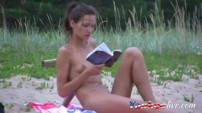 Girl Showing Her Pussy Reading A Book At A Public Beach - videomanysex.com