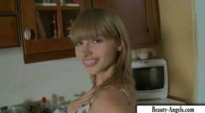 Aina, the young blonde, enjoys self-masturbation in the kitchen - sexu.com - Russia