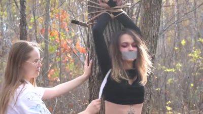 Girl Tied Up To The Tree - hclips.com