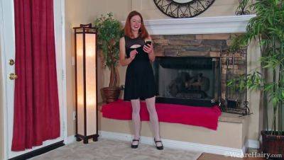 Cindy's Fiery Striptease: Redhead Removes Stockings on Rug - xxxfiles.com