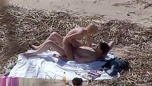 Couple fucks at the beach while guy masturbates - hdzog.com