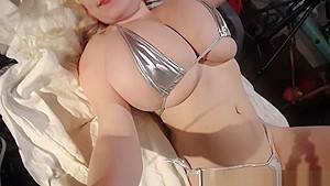 Blonde teen wearing a tiny bikini in her gigantic tits - hdzog.com