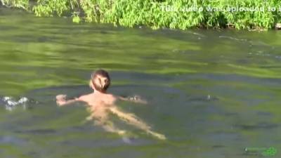 This woman loves to be nude in the river - hotmovs.com