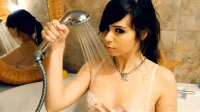 A brunette who loves to bathe and play - upornia.com