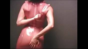Stripping in Pink Latex - xvideos.com