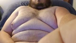 Chubby guy blows huge load on himself. - pornhub.com