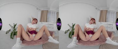 Redheaded Lilly in a tight miniskirt and thong gets her sweet spot fingered while wearing sneakers - alphaporno.com