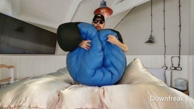 A man in a puffy jacket jerks off and cums hard on camera during a solo fetish session - yesvids.com