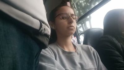 Young Brazilian woman with glasses rests on a bus while being subtly observed - yesvids.com - Brazil - Portugal